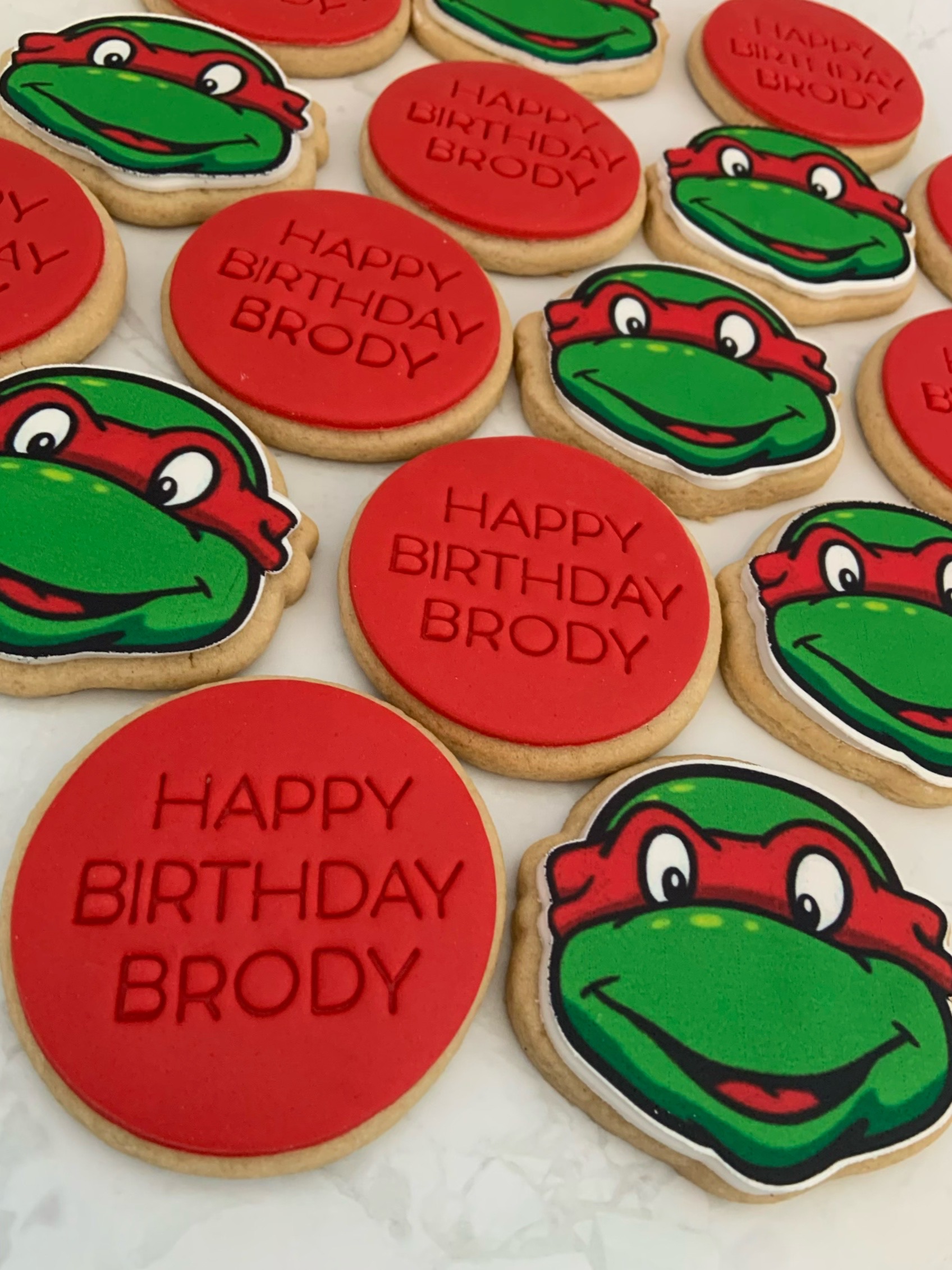 Custom name ninja turtles_red cookies Custom Name Ninja Turtles Birthday Cookies in red