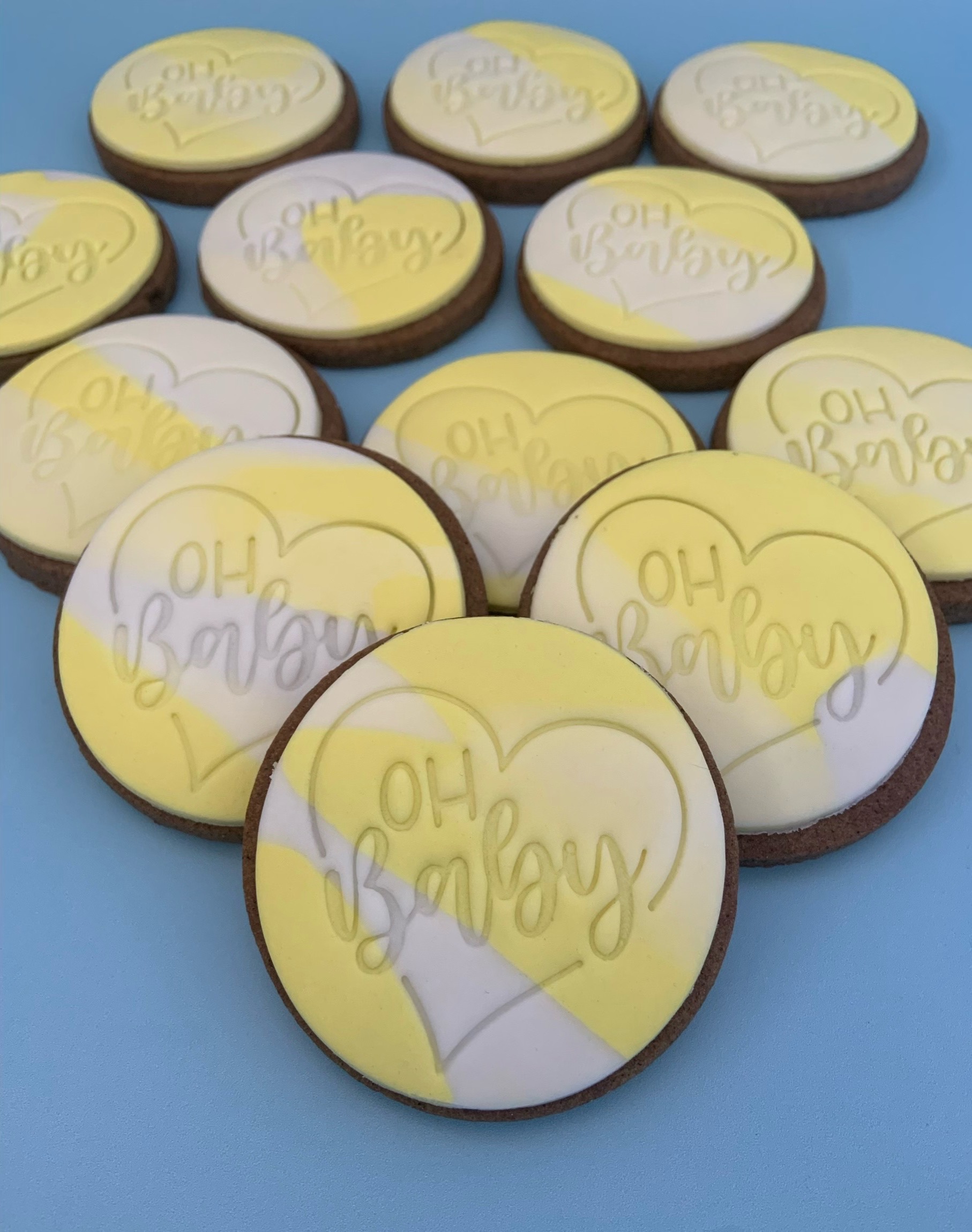 Oh Baby Cookies_yellow marble fondant Oh Baby Cookies finished in marbled yellow fondant