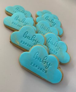 Cloud shaped cookies customised with baby's surname