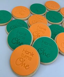 Hank turns One custom cookies in green and orange fondant